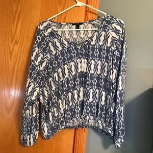 Blue and white patterned blouse top